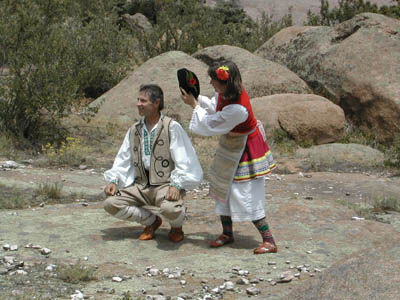 Storm Mountain Folk Dancers header with picture of dancers in Bulgarian costume