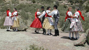 Storm Mountain Folk Dancers header with picture of dancers in Hungarian costume
