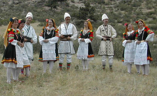 Storm Mountain Folk Dancers header with picture of dancers in Bulgarian costume